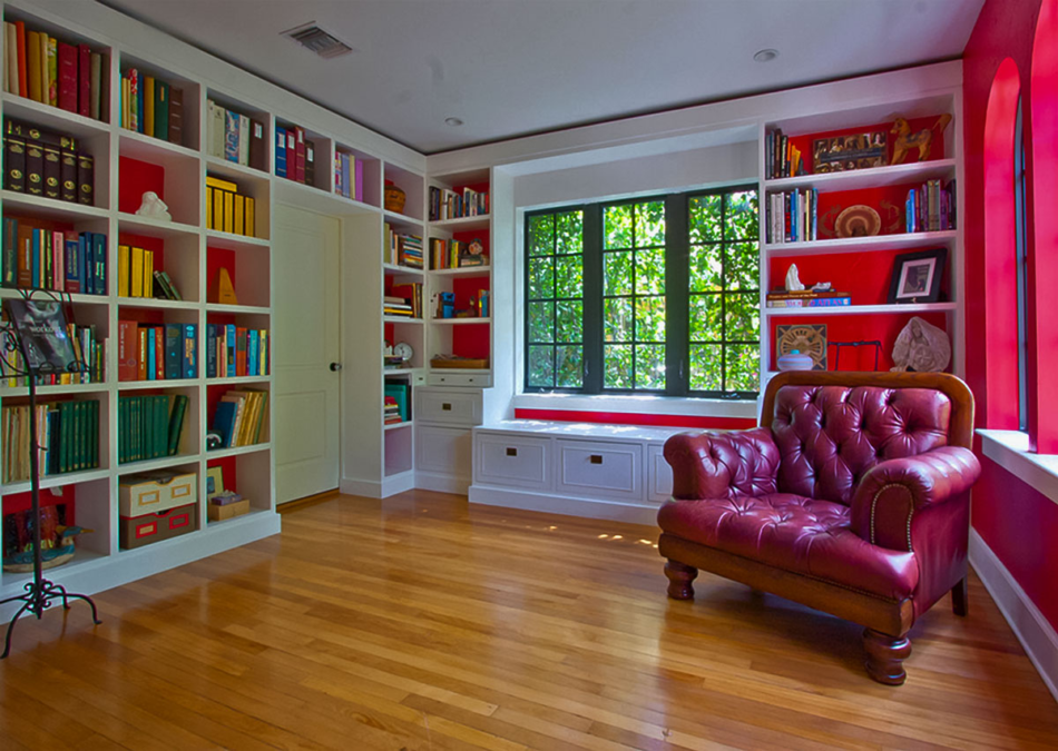 Colorful Media Center with Built-In Bookshelves


